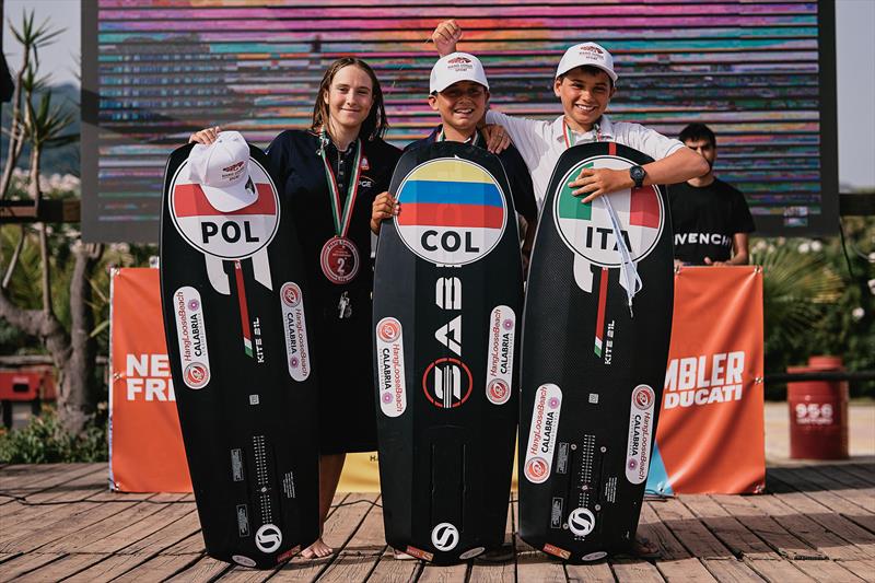 U15 podium Karolina Jankowska [POL], Jean Paul Villegas [COL] and Luis House [ITA] - 2024 Youth and Masters' Kitefoil World Championships - photo © IKA media/ Robert Hajduk