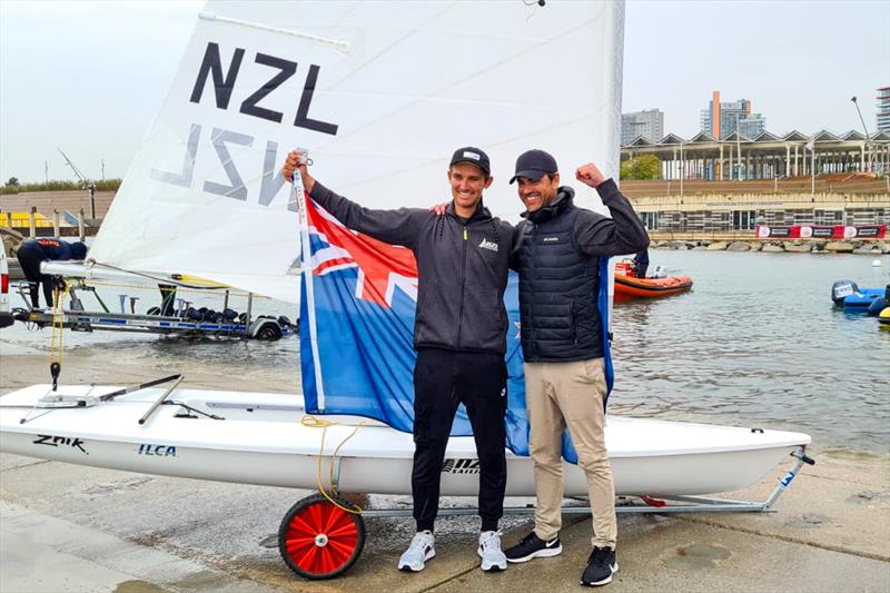 Tom Saunders celebrates with coach Mike Bullot - Laser/ILCA7 World Championship - Barcelona - November 2021. - photo © Yachting NZ