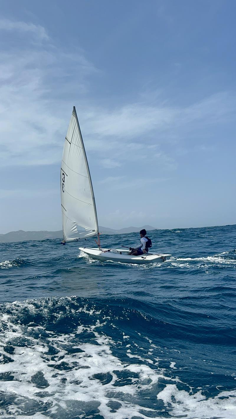 Kai Marks Dasent crossing the Bequia Channel between St. Vincent and Mustique photo copyright SVG Sailing taken at  and featuring the ILCA 4 class