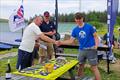 Winners collecting prizes - North ILCA UK circuit event at Pennine SC © Helen Dengate