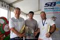 Team Desert Eagle on the podium during the SB20 Europeans 2025 in Ostend, Belgium Prize Giving © Anna Zyk
