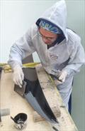Finishing the leading edge of the F50 rudder elevator - Mackay Boats - September 2025 © Mackay Boats
