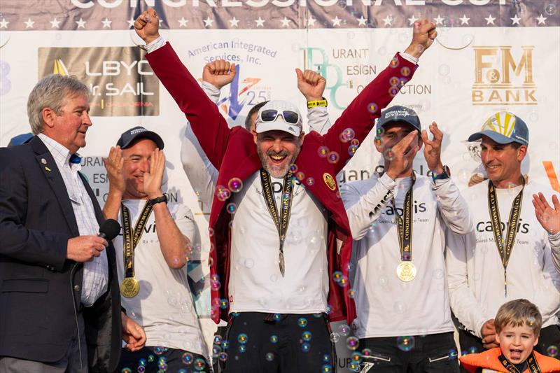 Switzerland's Eric Monnin celebrates winning the 60th Congressional Cup with his Capvis Swiss Match Racing Team of Ute Monnin Wagner, Mathieu Renault, Jean-Claude Monnin, Simon Brügger, Julien Falxa, and Maxime Mesnil - photo © Ian Roman / WMRT