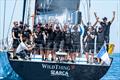 Furio Benussi and his ARCA SGR crew, collecting their prize for line honours once again &copy; Fabio Taccola