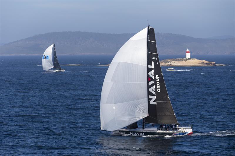 Naval Group )foreground) passing the Iron Pot at the mouth of the River Derwent, with the Maxi72 URM to windward photo copyright Andrea Francolini taken at Royal Yacht Club of Tasmania and featuring the Maxi class