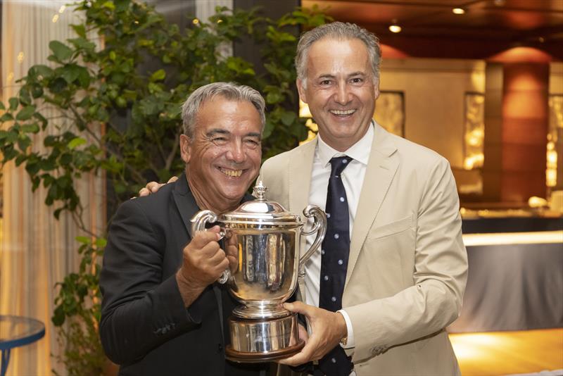Luciano Gandini is presented with the IMA Yacht of the Year Trophy for the outstanding performance of his Mylius 80 yacht Twin Soul B in 2021 photo copyright IMA / Studio Borlenghi taken at Yacht Club Costa Smeralda and featuring the Maxi class