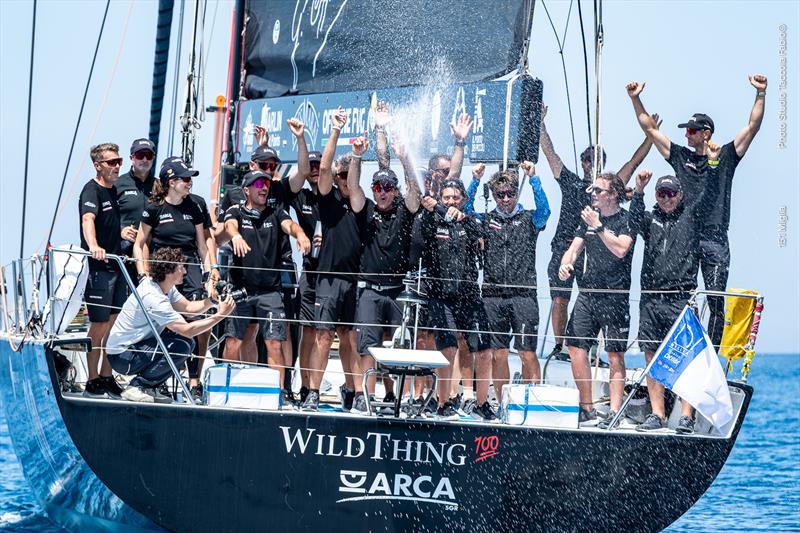 Furio Benussi and his ARCA SGR crew, collecting their prize for line honours once again photo copyright Fabio Taccola taken at Yacht Club Livorno and featuring the Maxi class