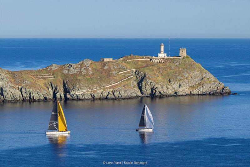 The Grand Soleil 80 LC Bianca II follows the Wally 60 Wallyño of Benoît de Froidmont past the Giraglia rock - photo © Loro Piana / Studio Borlenghi
