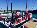 Sergio Sagromoso's Lazy Dog crew celebrating their first MC38 regatta at Audi Hamilton Island Race Week © Ellen Pragnell-Raasch