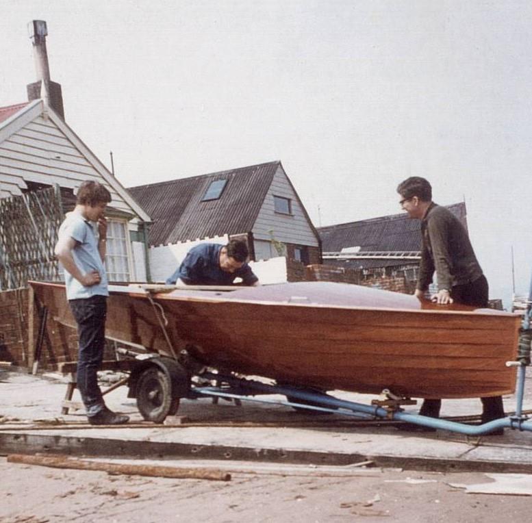 Jon Turner must have been a recent arrival at the Rowsell boatyard when this picture of owner Don Hearn collecting his new Merlin was taken - photo © Keith Callaghan