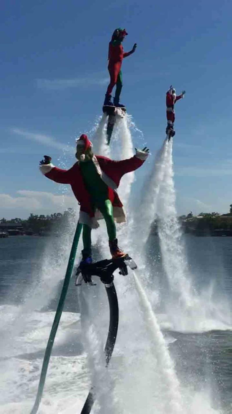 Santa arriving via JetPack Events, at Southport Yacht Club's 2017 Carols on the Broadwater celebrations at the Club's Main Beach Facility. - photo © Southport Yacht Club