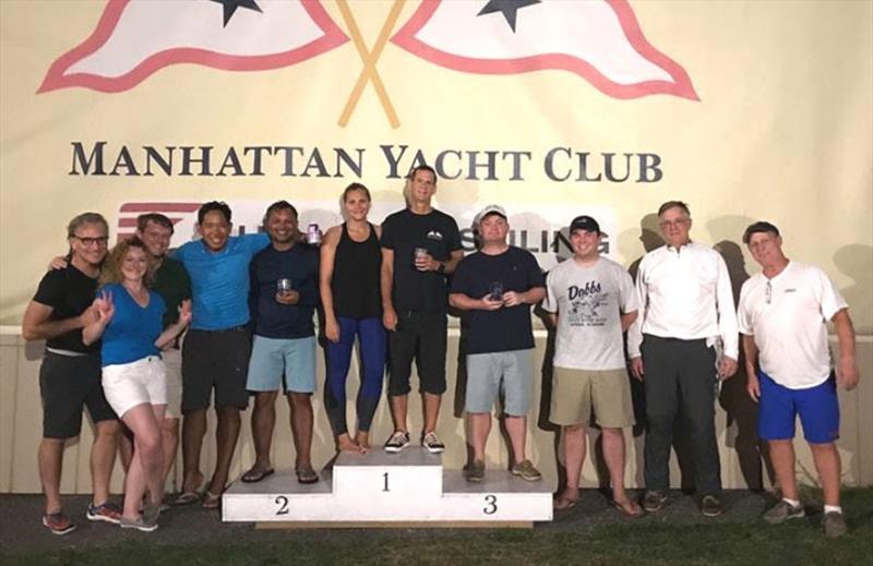 Everyone loves to stand on the winner's podium. (L to R): Steve Rawlings, Tatiana Volkova, Paul Wilson, Alex Mallari, Ed Rambali, Sara Wiss, Michael Barry, Eric Hoyle, Geoff Bernard, Erik van Nispen, and Rick Kern - J/24 Racing at Manhattan Yacht Club - photo © Manhattan Yacht Club