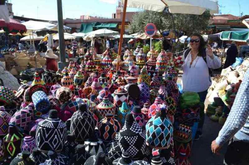 Maree trying to pick one pot from the many colour combinations on offer photo copyright SV Red Roo taken at 