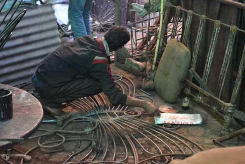 Artisan at work in the back streets - photo © SV Red Roo