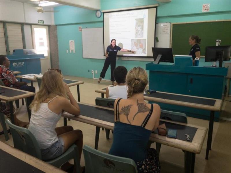 Students listen to presentation photo copyright Race For Water taken at 