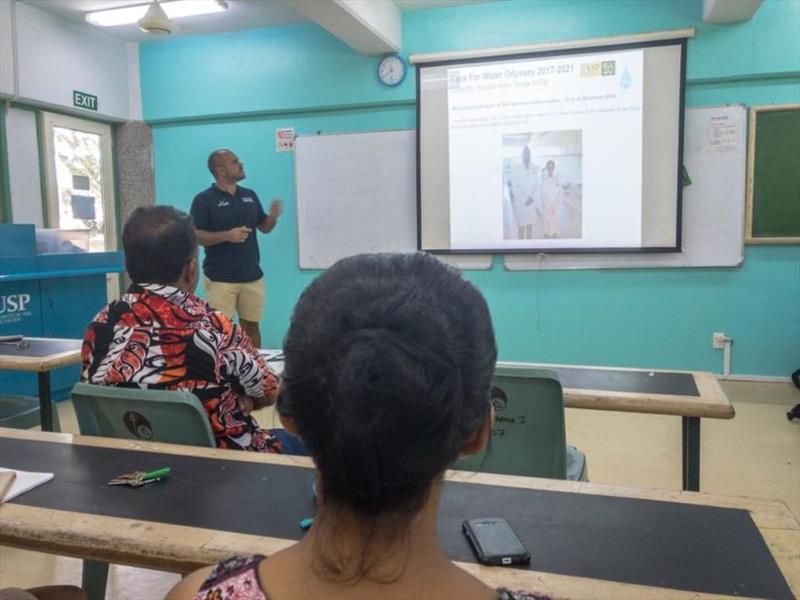 Students listen to presentation photo copyright Race For Water taken at 