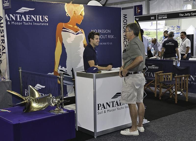 Chris Tilley speaking with a client at the Sanctuary Cove International Boat Show photo copyright John Curnow taken at 