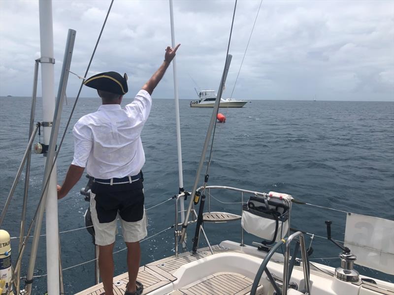 Saluting the committee boat, 'Reel Extreme' Denis from yacht Pretaixte - photo © World Cruising Club