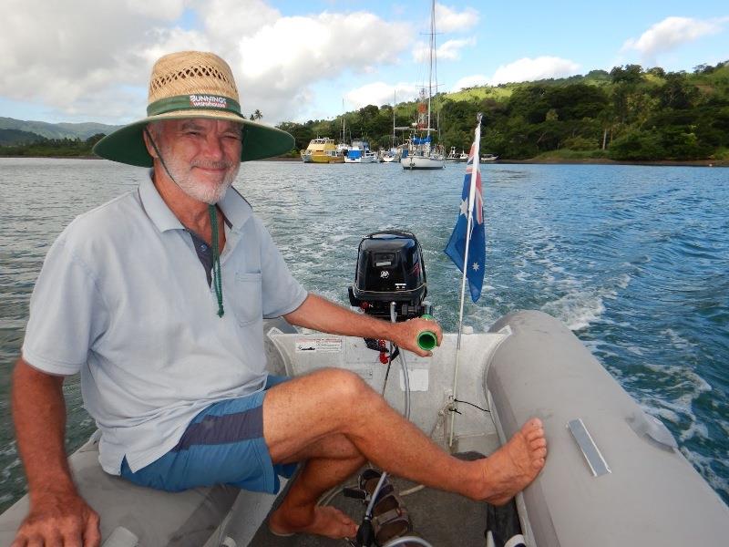 Andrew with the new outboard - photo © Andrew and Clare Payne / Freedom and Adventure
