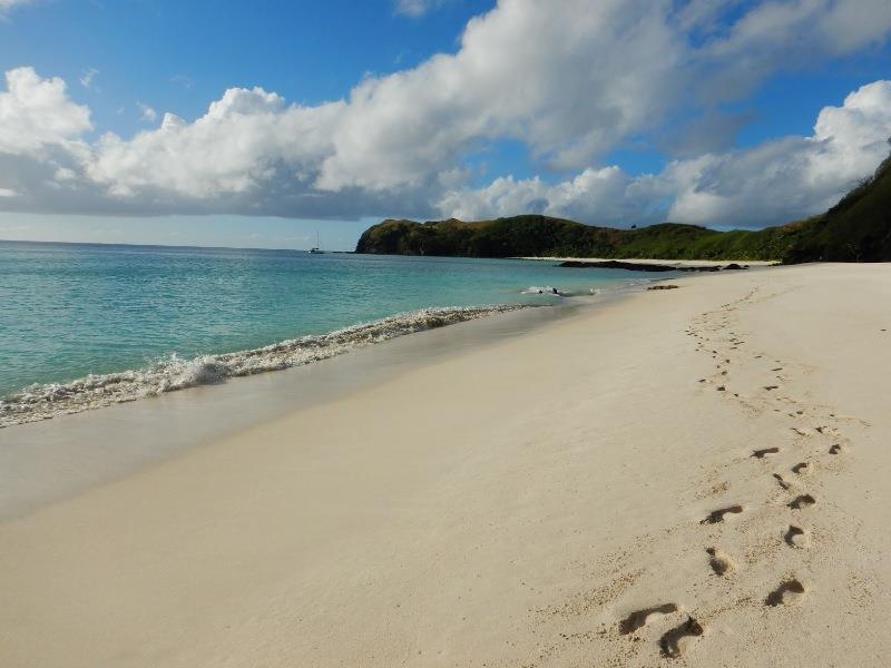 Our footprints on the beach, Eye Candy far in the background - photo © Andrew and Clare Payne / Freedom and Adventure