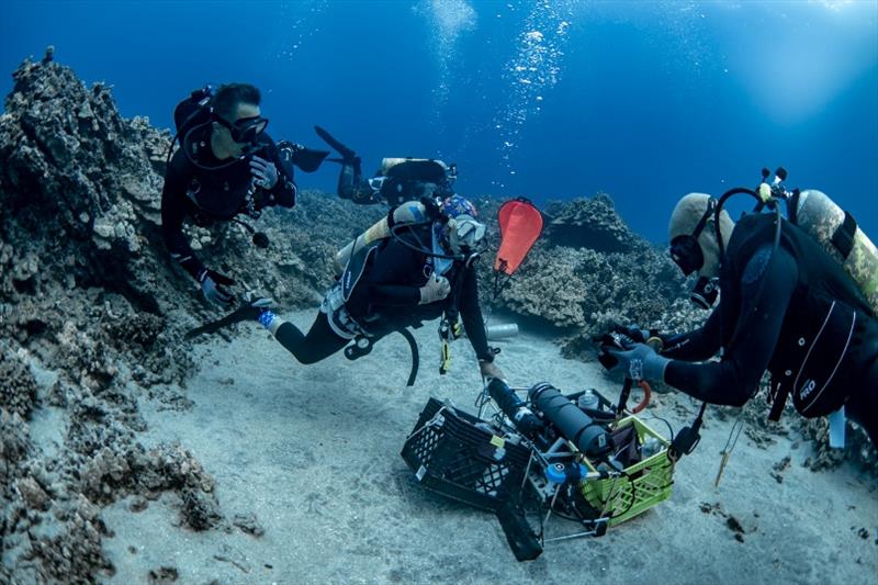 Our ocean and climate change team deploys the `diel suite` instrument package in Papa Bay. These instruments measure the daily variability in oceanic temperature, salinity, pH, oxygen, water flow to assess environmental conditions on Hawai'i's coral reefs - photo © NOAA Fisheries, Hawai'i Marine Education and Research Center / Paul Cox