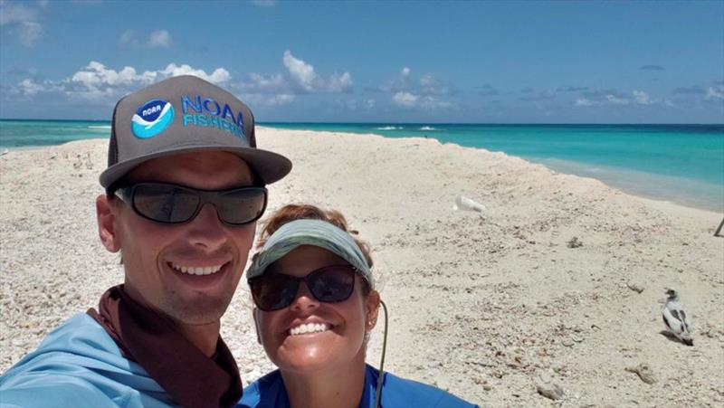 Marine turtle field researchers Jan Willem and Marylou Staman pose for a photo on remnants of East Island, French Frigate Shoals. Collectively over past few years, this was their home for 10 months and the Hawaiian green sea turtle's primary nesting beach - photo © NOAA Fisheries / Jan Willem Staman