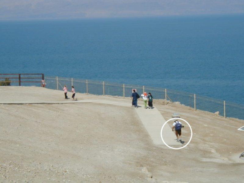 Dead Sea beach walk with armed civilian photo copyright Hugh & Heather Bacon taken at 