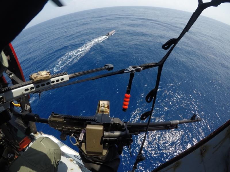 A helicopter interdiction tactical squadron with the Coast Guard Cutter Escanaba in pursuit of a drug smuggling vessel in the Caribbean Sea, April 2020 photo copyright Petty Officer 2nd Class Michael Trees / U.S. Coast Guard taken at 