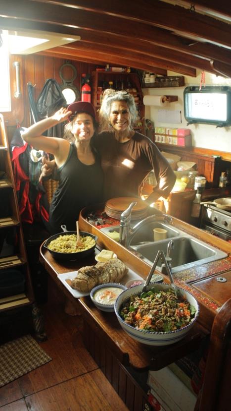 Ari and crew prepping dinner onboard photo copyright Jorge Rodriguez Roda taken at 