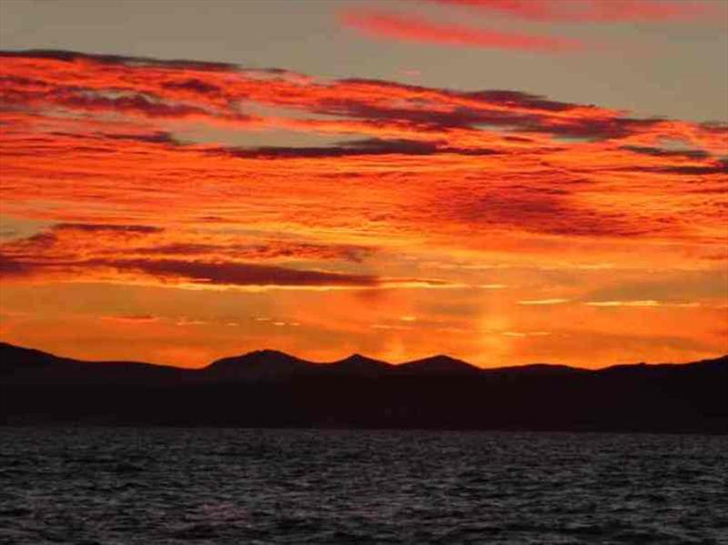 Sunrise as we approach the coast of Tunisia photo copyright Red Roo taken at 