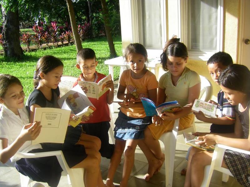 Children love books - photo © Hugh & Heather Bacon