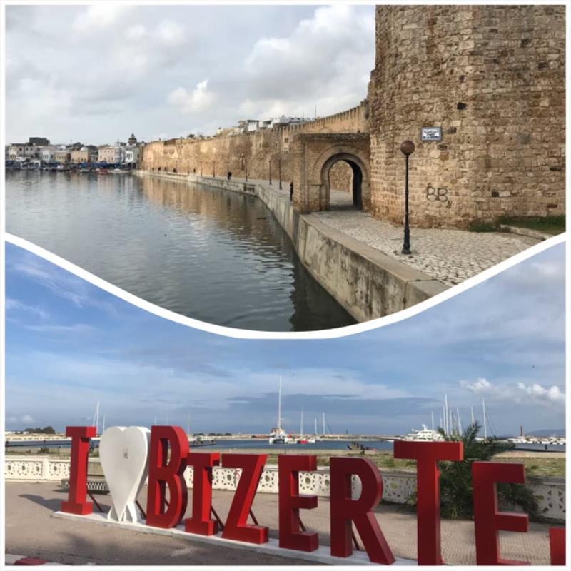 Bizerte – The old town wall beside the canal into where the local fishing fleet (small row boats) reside. Red Roo in the marina above the “E” in the I Love Bizerte sign photo copyright SV Red Roo taken at 