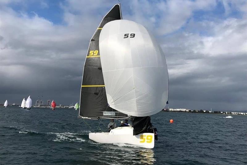 Retro - sailed by Derek Scott, Ben Costello and Richard Bicknell photo copyright Elliott 5.9 Class Owners Association taken at 