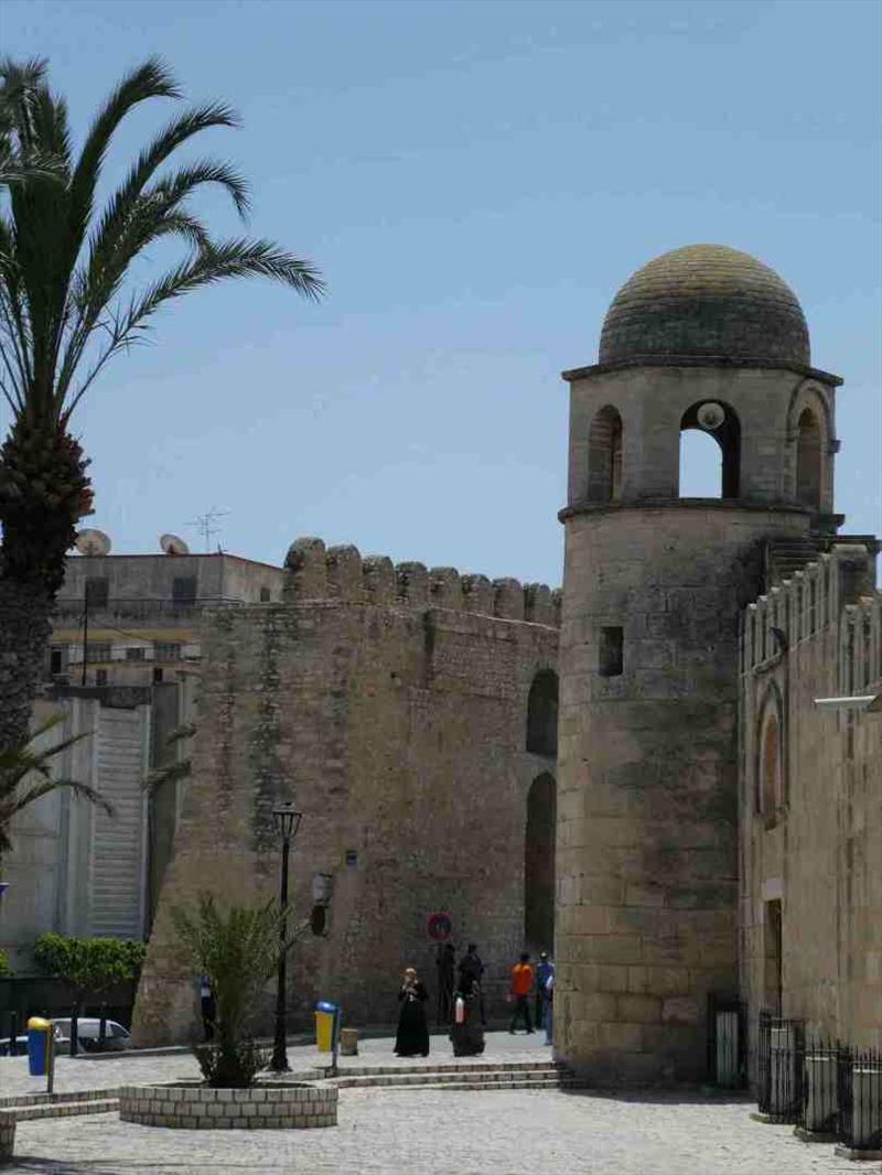 The thick and high Medina walls (left) and the Mosque (right) - photo © SV Red Roo