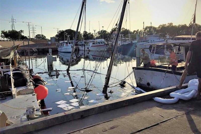 The Anniki's masts protrude from the water in the Frances Bay Mooring Basin. - photo © ABC Radio Darwin / Conor Byrne