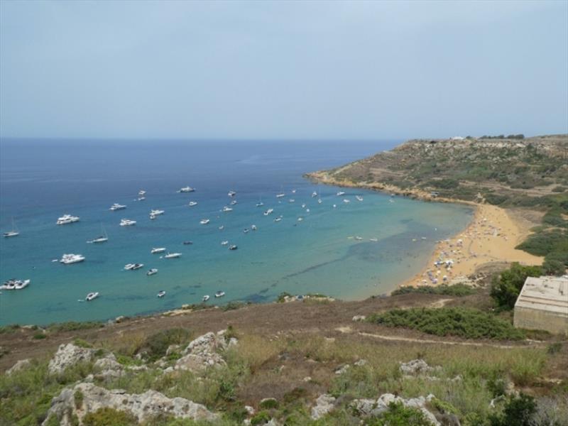 Busy with boats near the beach - photo © SV Red Roo