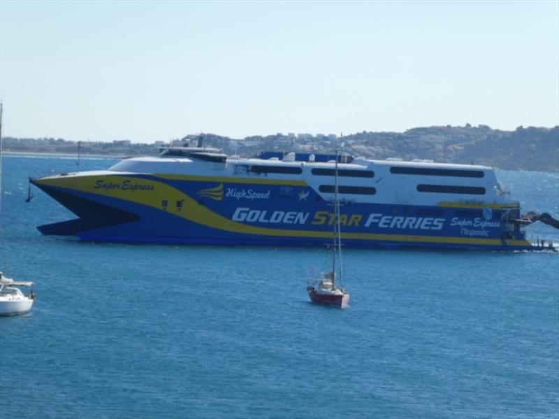 Red Roo on anchor at Naxos, with a local ferry coming into dock behind us photo copyright Red Roo taken at 