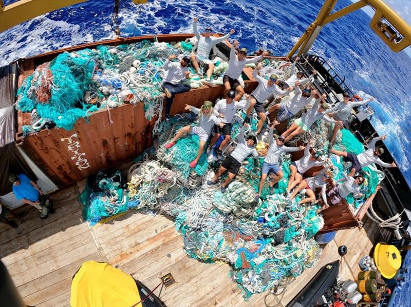 The team takes a well-earned rest after removing close to 124,000 pounds of marine debris. - photo © NOAA Fisheries / James Morioka