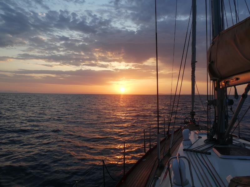 Sunrise during the passage to Santorini photo copyright SV Red Roo taken at 