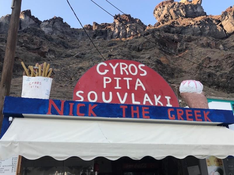 At the ferry dock on Thirasia, Phils perfect Greek meal a Gyros and ice cream. - photo © SV Red Roo