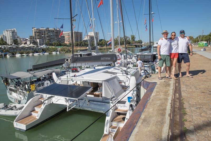 Jim, Kingsley and Katherine Webb in front of their Outremer 51, Inky Blue photo copyright Carmen Hidalgo / GLYWO taken at 