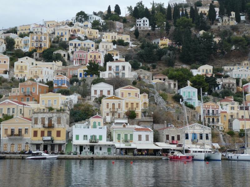 Debbie and Paul from Australian boat Wild Odyssey took these photos of Red Roo arriving at Symi Harbour. - photo © SV Red Roo