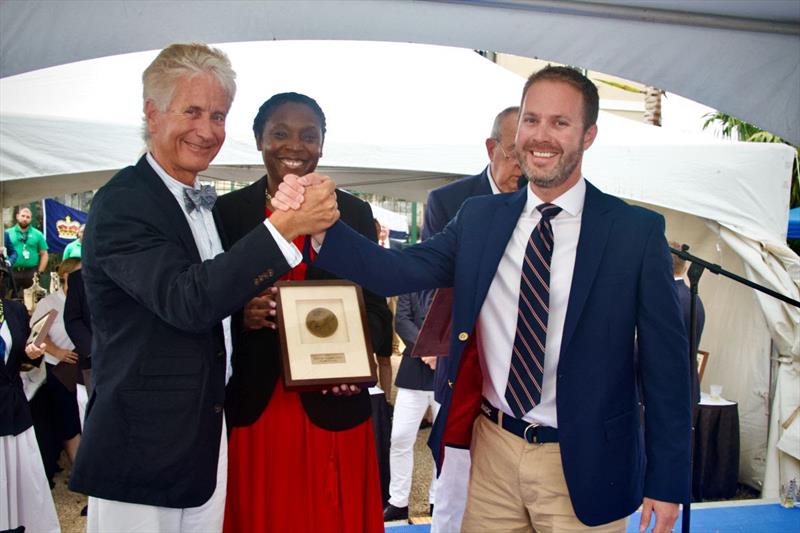 Glenn and Darren Walters receive Alchemist's class 2nd place prize from Her Excellency, the Governor of Bermuda, Ms. Rena Lalgie at the Prize-Giving photo copyright Trixie Wadson taken at Royal Bermuda Yacht Club