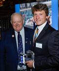 Cal Currier (right) receives the 2022 Young Voyager Award from CCA Commodore Chris Otorowski © Dan Nerney