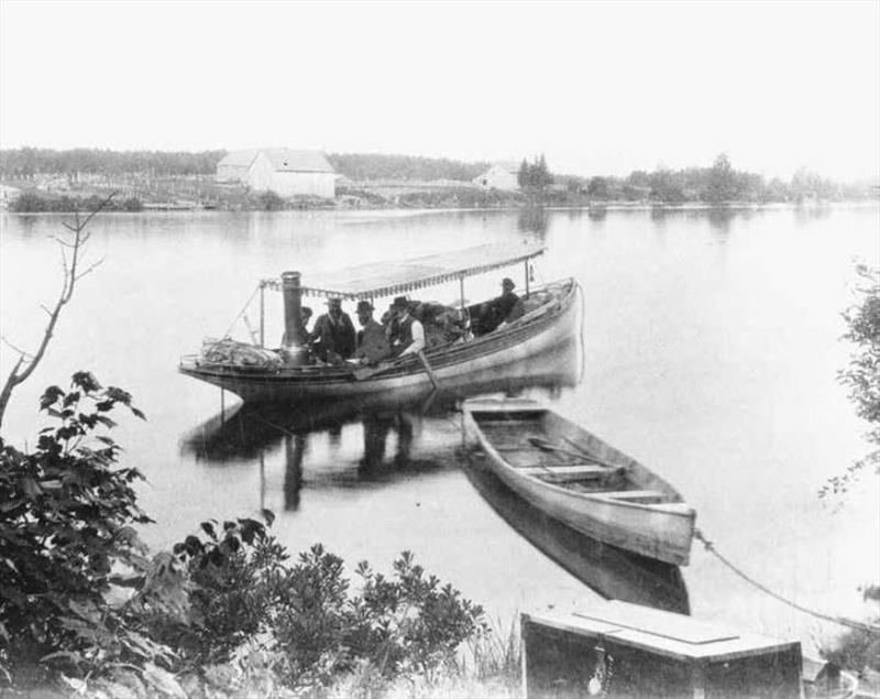 Abbie, with her awning rigged, prepared to venture north through the Portage River, a partly natural, partly dredged waterway bisecting the Keeweenaw Peninsula - photo © Marquette Regional History Center