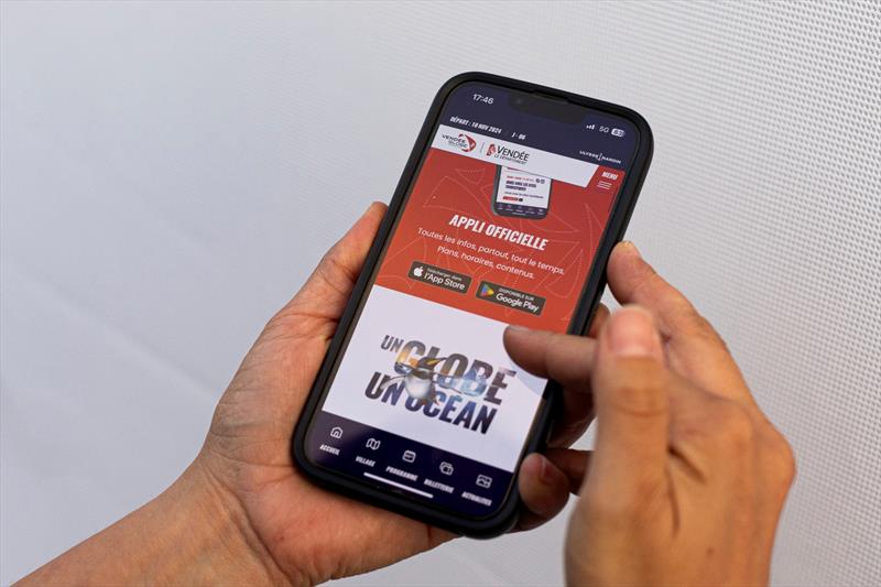 General view of the race digital application on mobile phones during prestart of the Vendée Globe - photo © Lloyd images / Alea / VG24