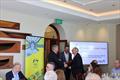 AOC President and Australian CEO Malcolm Page distributed Olympic Pins © Australian Sailing