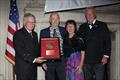 Blue Water Medal awardee Pete Hill and partner Linda Crew-Gee receive the honor from the incoming CCA Commodore Chace Anderson, left, and outgoing CCA Commodore Jay Gowell &copy; Guy Gurney