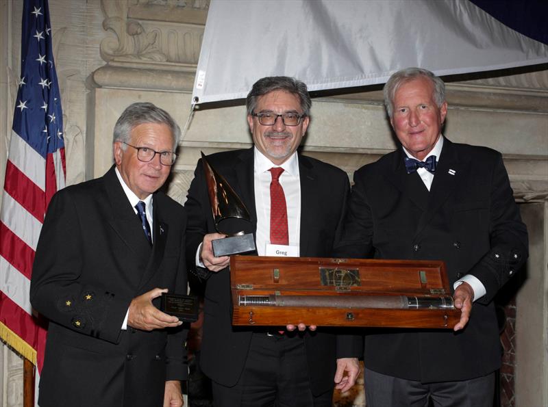 Philip “Greg” Velez, center, receives the Rod Stephens Seamanship Trophy from the incoming CCA Commodore Chace Anderson, left, and outgoing CCA Commodore Jay Gowell - photo © Guy Gurney