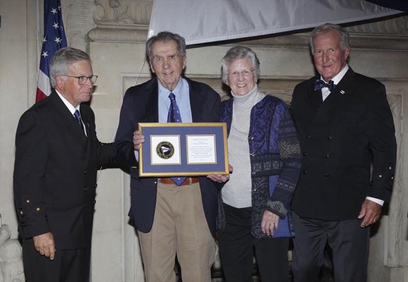 Doug and Dale Bruce, center, are recipients of the 2025 Richard S. Nye Trophy. With them are incoming CCA Commodore Chace Anderson, left, and outgoing CCA Commodore Jay Gowell - photo © Guy Gurney